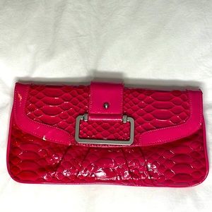 Snakeskin embossed clutch with silver hardware